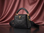 LOUIS VUITTON Luxury Black Embossed Leather Top-Handle Bag