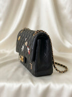 Chanel Limited Edition | Black Leather with Space Charm Embellishments –| LisaLuxuryHub