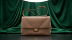 CHANEL Taupe Pebbled Leather Flap Bag with Gold Twist-Lock