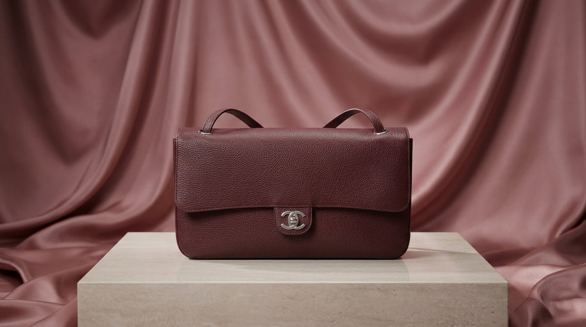 CHANEL Burgundy Pebbled Leather Flap Bag with Silver Twist-Lock