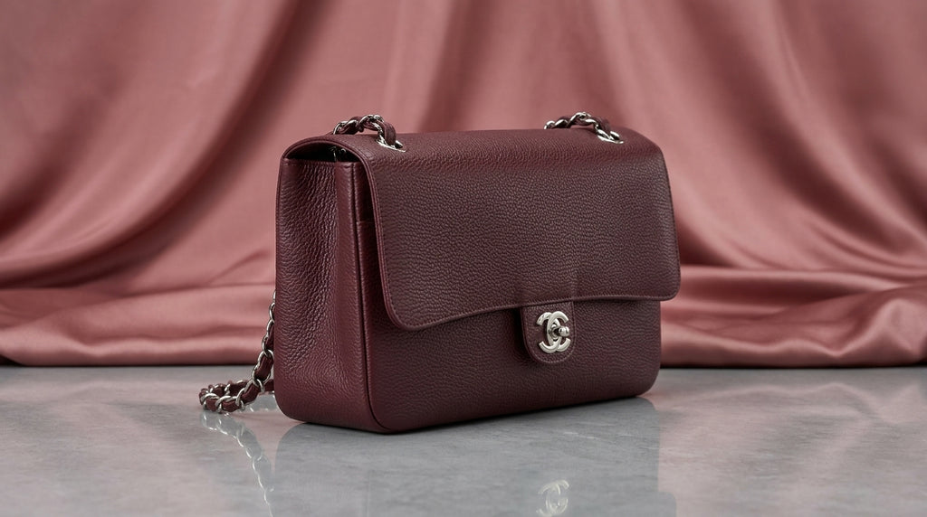 CHANEL Burgundy Pebbled Leather Flap Bag with Silver Twist-Lock