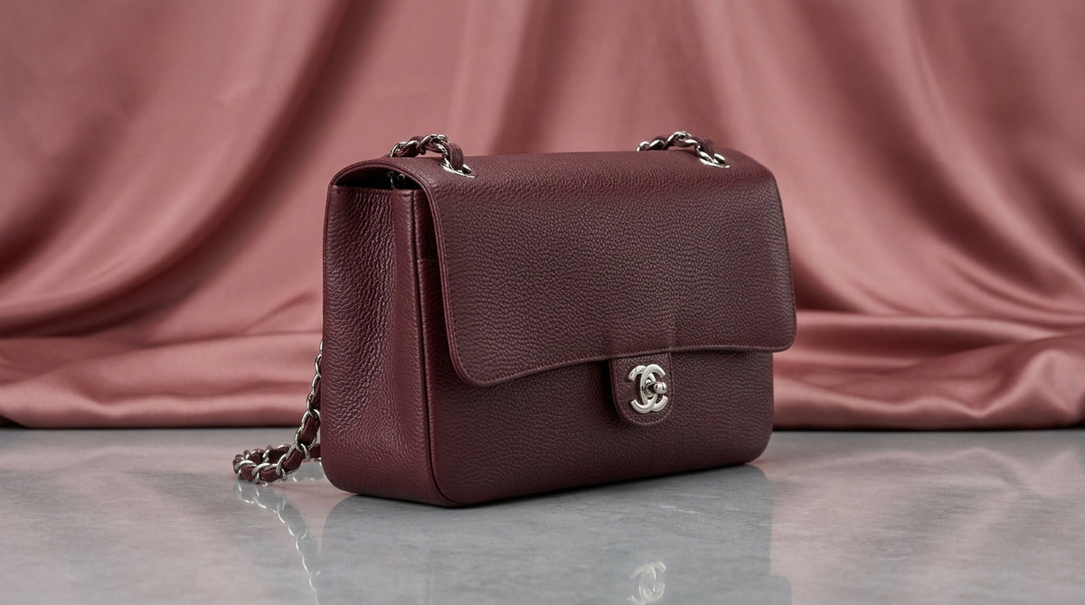 CHANEL Burgundy Pebbled Leather Flap Bag with Silver Twist-Lock