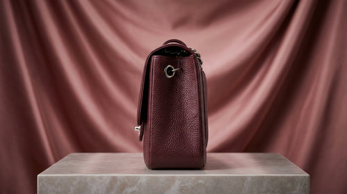 CHANEL Burgundy Pebbled Leather Flap Bag with Silver Twist-Lock