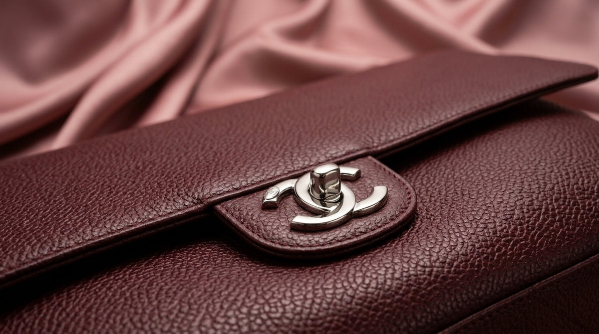 CHANEL Burgundy Pebbled Leather Satchel with Twist-Lock Closure