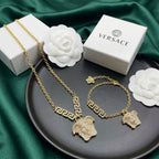 Versace Gold-Tone Crystal Mythical Face Pendant Jewelry Set – 2 Pieces