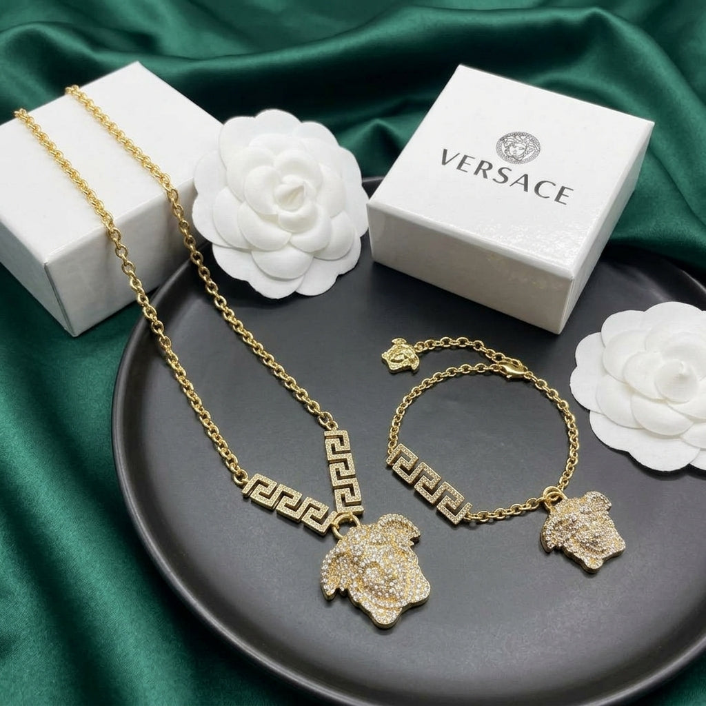 Versace Gold-Tone Crystal Mythical Face Pendant Jewelry Set – 2 Pieces