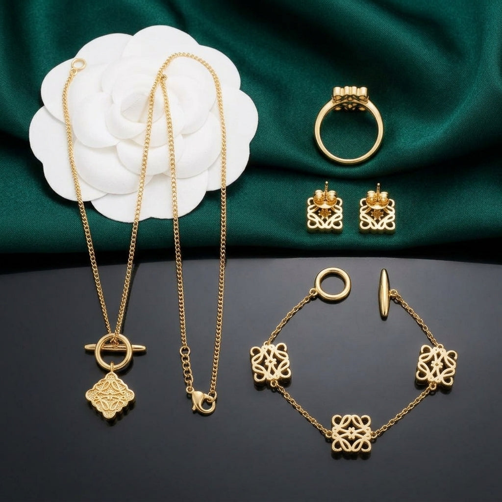 Loewe Gold-Tone Filigree Charm Jewelry Set – 4 Piece