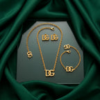 Gold-Tone Interlocking Letter Charm Jewelry Set – 3 Pieces