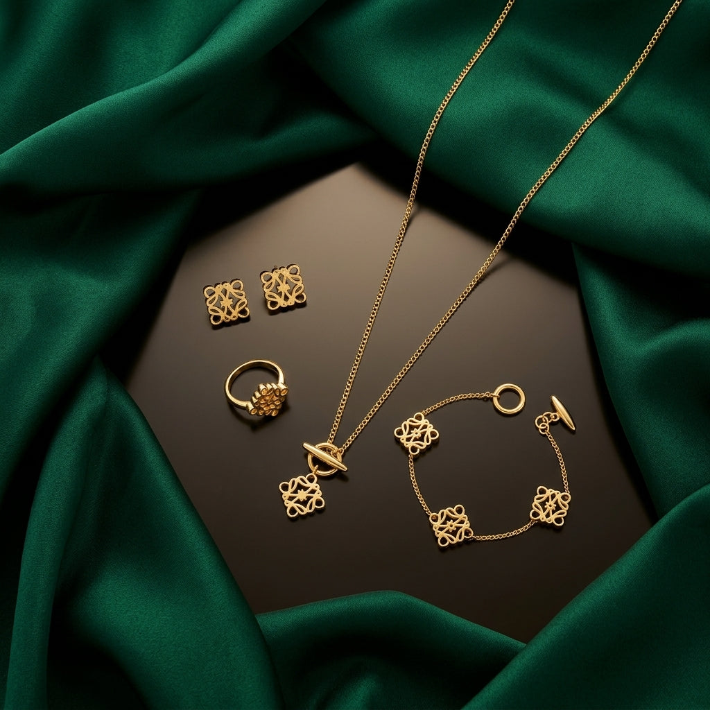 Loewe Gold-Tone Filigree Charm Jewelry Set – 4 Piece