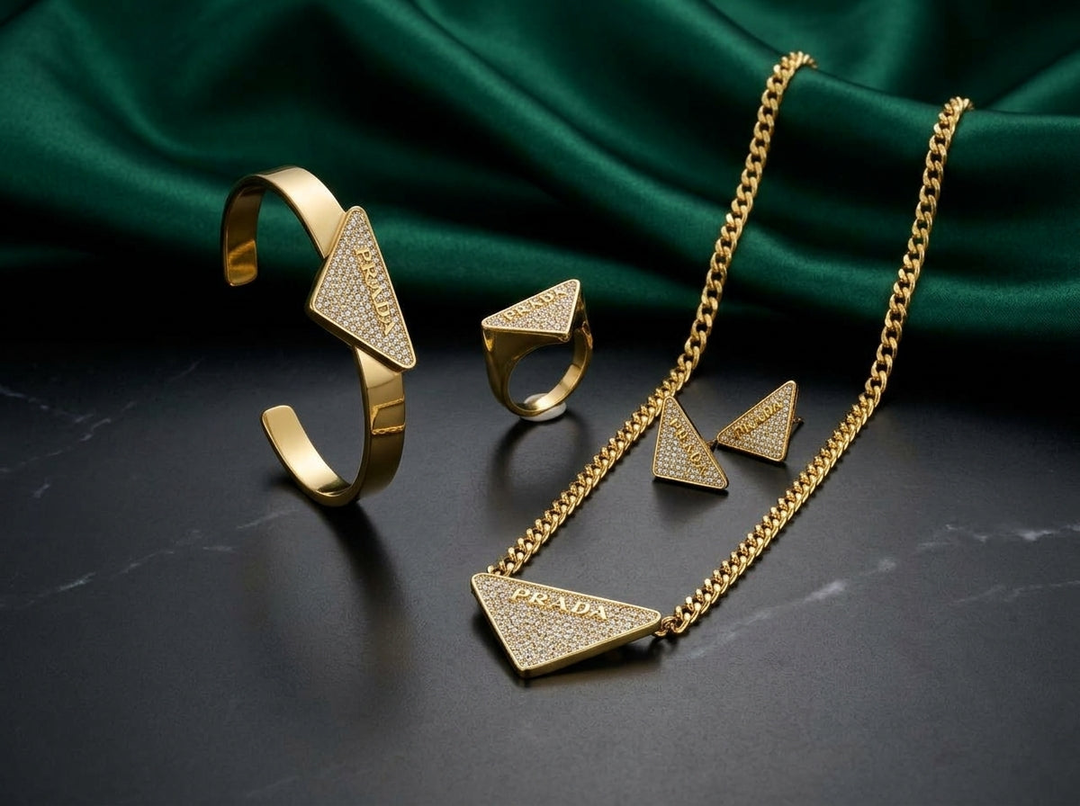Prada Gold-Tone Crystal Pavé Triangle Jewelry Set – 4 Pieces
