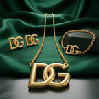 Gold-Tone Interlocking Letter Charm Jewelry Set – 3 Pieces