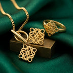 Loewe Gold-Tone Filigree Charm Jewelry Set – 4 Piece
