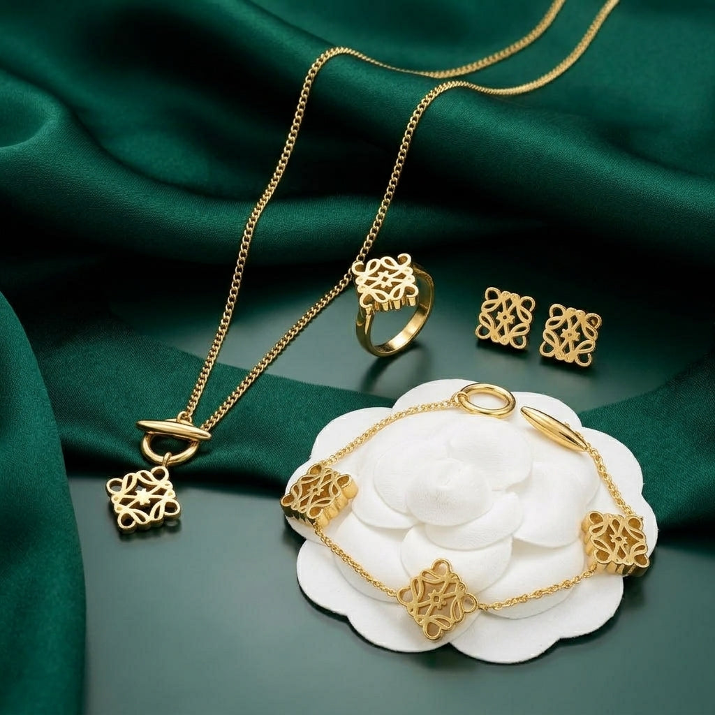 Loewe Gold-Tone Filigree Charm Jewelry Set – 4 Piece