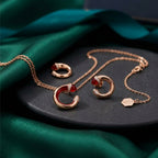 Marli Rose Gold-Tone Ruby-Accent Open Circle Jewelry Set – 2 Pieces