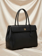 Chanel Large Tote Bag | Black Grained Leather with Gold CC Charm & Tassel –| LisaLuxuryHub