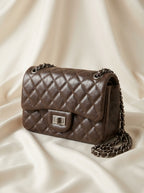 Chanel 2.55 Reissue Flap Bag | Dark Brown Aged Leather with Silver Hardware –| LisaLuxuryHub
